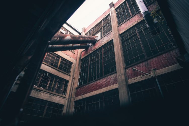 architectural photography of brown concrete building
