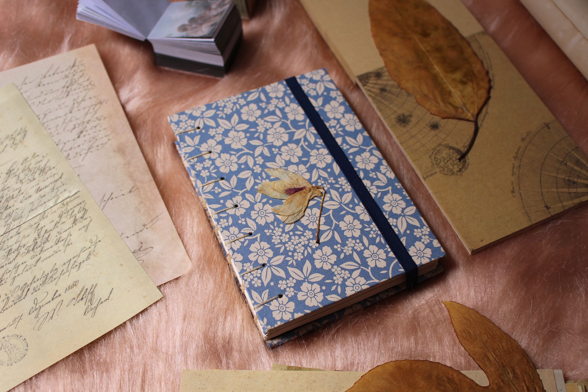 dried flower on journal